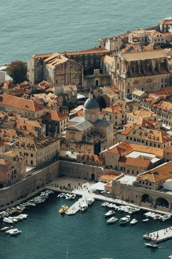 Capture of Dubrovnik's charming old town with its ancient walls and harbor.