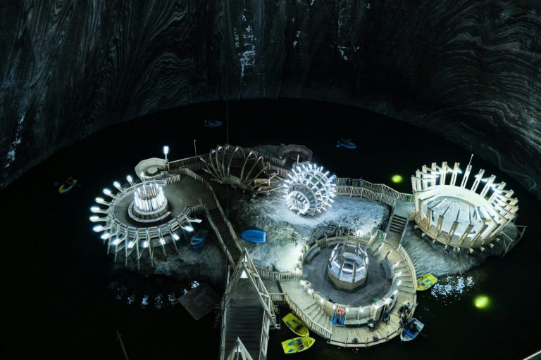 A captivating high angle view of an illuminated underground salt mine museum with striking architecture.